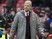 Arsene Wenger shows off his Winter 2016 look during the Premier League game between Manchester United and Arsenal on November 19, 2016