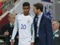 England forward Marcus Rashford speaks with interim manager Gareth Southgate during his side's international friendly with Spain at Wembley on November 15, 2016