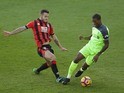 Jack Wilshere and Georginio Wijnaldum in action during the Premier League game between Bournemouth and Liverpool on December 4, 2016