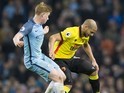 Adlene Guedioura attempts to bully Kevin De Bruyne during the Premier League game between Manchester City and Watford on December 14, 2016