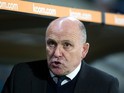 Hull City manager Mike Phelan watches on during his side's Premier League clash with Manchester City at the Etihad Stadium on Boxing Day