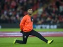 Daniel Sturridge warms up ahead of the Premier League game between Liverpool and Manchester City on December 31, 2016