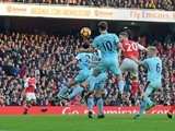 Shkodran Mustafi heads in the opener during the Premier League game between Arsenal and Burnley on January 22, 2017