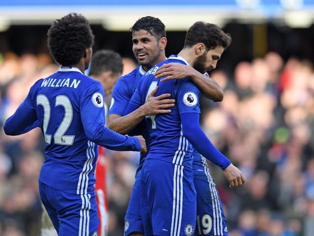 Cesc Fabregas sort of celebrates the Blues' third during the Premier League game between Chelsea and Arsenal on February 4, 2017