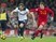 Harry Kane and Lucas Leiva in action during the Premier League game between Liverpool and Tottenham Hotspur on February 11, 2017