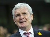 Mark Hughes 'smiles' before the match between Manchester City and Stoke City on March 8, 2017