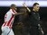 Stoke City's Saido Berahino grabs the arm of referee Neil Swarbrick during the Premier League match against Manchester City on March 8, 2017