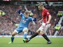 Luke Shaw and Ryan Fraser in the match between Manchester United and Bournemouth on March 4, 2017