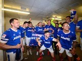 Portsmouth players celebrate promotion to League One on April 17, 2017