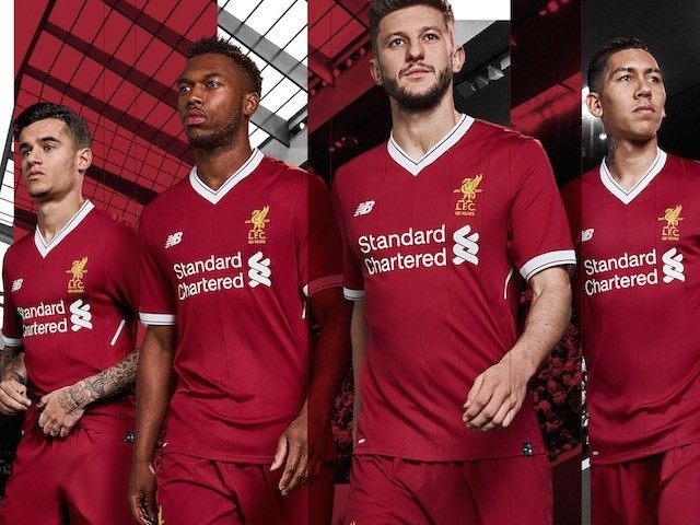 Liverpool players model the new home kit for the 2017-18 season