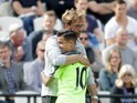 Jurgen Klopp celebrates with Philippe Coutinho after the Premier League game between West Ham United and Liverpool on May 14, 2017
