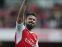 Olivier Giroud waves during the Premier League game between Arsenal and Manchester United on May 7, 2017