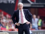 Mark Hughes watches on during the Premier League game between Bournemouth and Stoke City on May 6, 2017