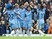 David Silva celebrates with teammates after scoring during the Premier League game between Manchester City and Leicester City on May 13, 2017