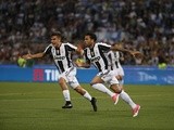Juventus's Davi Alves celebrates scoring during the Coppa Italia final against Lazio on May 17, 2017