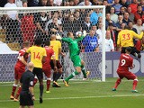 Stefano Okaka scores the opener during the Premier League game between Watford and Liverpool on August 12, 2017