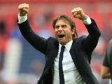 Antonio Conte celebrates during the Premier League game between Tottenham Hotspur and Chelsea on August 20, 2017