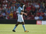 Raheem Sterling walks off after seeing red during the Premier League game between Bournemouth and Manchester City on August 26, 2017