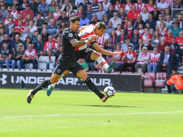 Manolo Gabbiadini opens the scoring during the Premier League game between Southampton and West Ham United on August 19, 2017