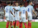 Eric Dier celebrates with teammates after scoring during the World Cup qualifier between England and Slovakia on September 4, 2017