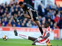 Marcus Rashford and Kurt Zouma in action during the Premier League game between Stoke City and Manchester United on September 9, 2017