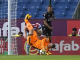 Tom Heaton is injured as he falls over Bee Mee during the Premier League game between Burnley and Crystal Palace on September 10, 2017